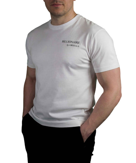 Male model wearing the Billionaire by ORVELLA white luxury T-shirt with subtle chest branding, clean structured fit, and refined everyday styling.