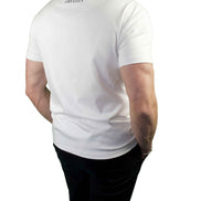 Rear view of a male model wearing the Billionaire by ORVELLA white luxury T-shirt, featuring subtle ORVELLA back neck branding and a clean structured fit.