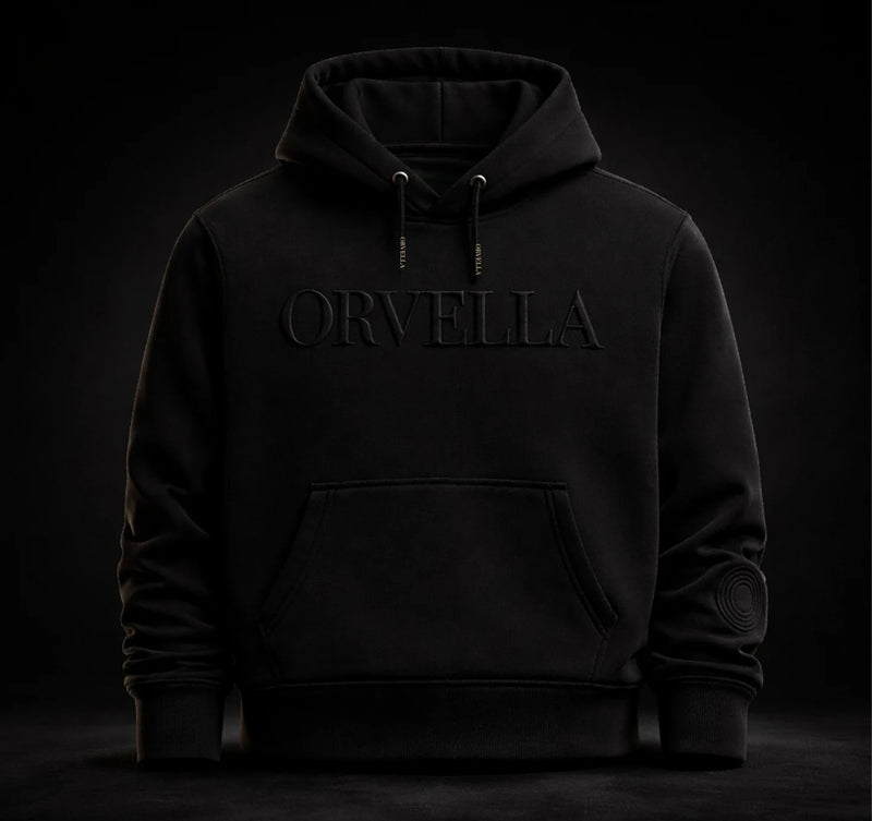 Black hoodie with 'Orvella' branding on a dark background