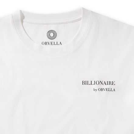 Close-up of the Billionaire by ORVELLA white luxury T-shirt, showing the chest branding, inner neck logo, clean collar stitching, and smooth premium fabric.