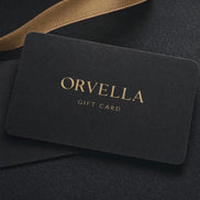 Orvella Gift Card Video in textured black with a gold ribbon
